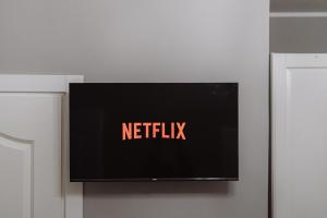 TV a/nebo společenská místnost v ubytování Rooms Genova dei Rolli