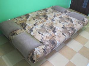 Posteľ alebo postele v izbe v ubytovaní Apartment Na Antonova-Ovseenko