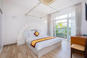 Postel nebo postele na pokoji v ubytování R7 Aria Resort + 49 fotografií