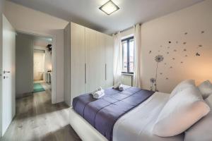 Giường trong phòng chung tại Ampio Quadrilocale [Navigli/Forum] + Free Parking