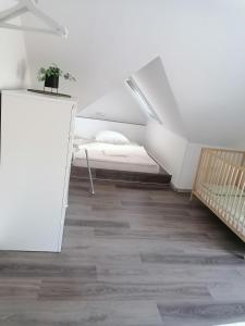 Postel nebo postele na pokoji v ubytování Ferienwohnung Mühlenblick