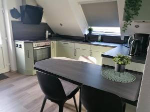 Kuchyň nebo kuchyňský kout v ubytování Ferienwohnung Mühlenblick