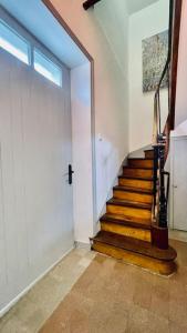a hallway with a staircase in a house at Villa Ker Den in Crozon