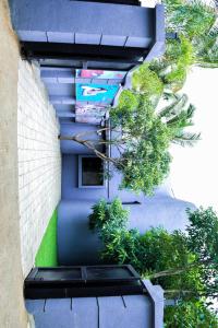 a staircase with plants on the side of a building at Jadhav Farms in Pune