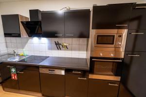 Dapur atau dapur kecil di ATRIUM - komfortables Apartment HORCHHEIMER