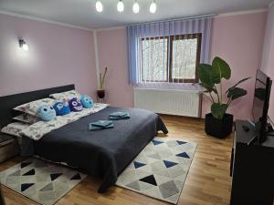 Postel nebo postele na pokoji v ubytování Casa Alex