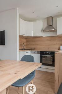 Kuchyň nebo kuchyňský kout v ubytování R'Apparts T2 Refuge Chic