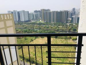 a view of a city from a balcony at VVA HOMES in Ghaziabad