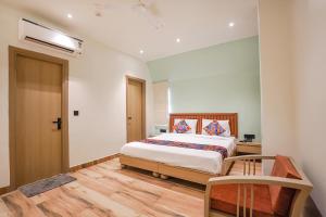 Postel nebo postele na pokoji v ubytování FabHotel Prime IP Indrapuram