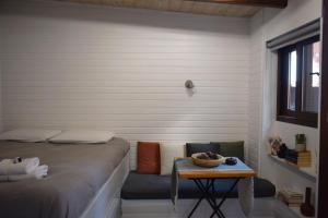 Postel nebo postele na pokoji v ubytování Su Casa Studio