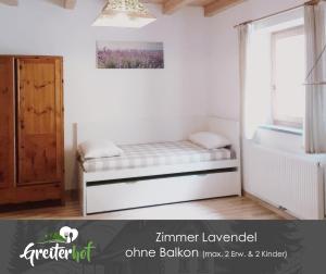 Letto o letti in una camera di Greiterhof Partschins