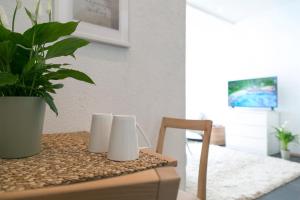 TV a/nebo společenská místnost v ubytování I Innenstadt I King-Size-Bett I