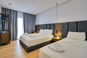 Postel nebo postele na pokoji v ubytování Hotel Siars