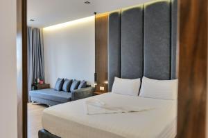 Postel nebo postele na pokoji v ubytování Hotel Siars