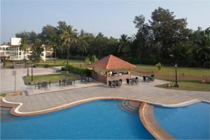 Bazén v ubytování Kenilworth Resort & Spa, Goa nebo v jeho okolí