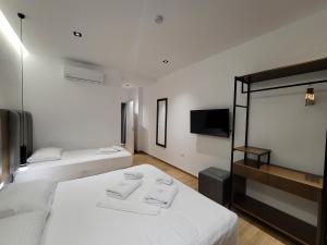Postel nebo postele na pokoji v ubytování Hotel Siars