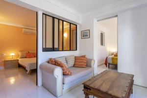 Ein Bett oder Betten in einem Zimmer der Unterkunft Villa Piscine à la Fustera Benissa