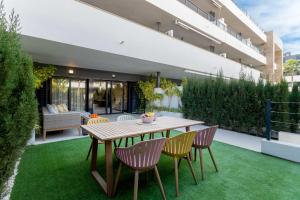Patio lub wspólna przestrzeń na świeżym powietrzu w obiekcie Flamenca Village