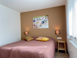 Postel nebo postele na pokoji v ubytování Zoutelande Koddelaan vakantiewoning
