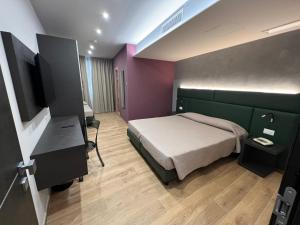 TV a/nebo společenská místnost v ubytování Hotel & Residence Castelli