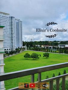 a view of a park with trees and buildings at Tagaytay affordable staycation by Elixir's Coolsuite in Tagaytay