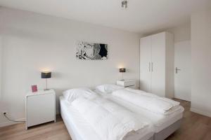 Ένα ή περισσότερα κρεβάτια σε δωμάτιο στο Sterflat 107