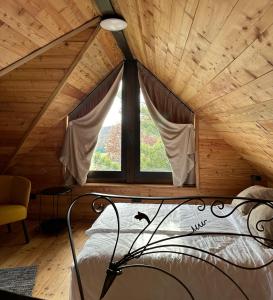 Postel nebo postele na pokoji v ubytování Ozoni & Sauna