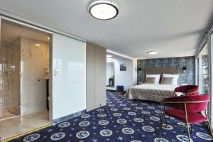 Postel nebo postele na pokoji v ubytování Hotel Jan