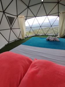 En eller flere senge i et værelse på casa de campo el porvenir