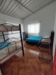 En eller flere senge i et værelse på casa de campo el porvenir + 11 billeder