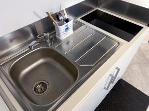 Una cocina o zona de cocina en Le Stanze di Gianmarmo - Via Marsala