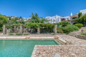 The swimming pool at or close to Lefkes Village Living