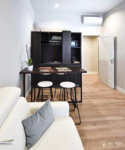 Kuchyň nebo kuchyňský kout v ubytování Alba Rosa Rooms
