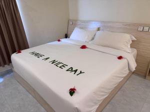 Letto o letti in una camera di INFINITE LAGOON