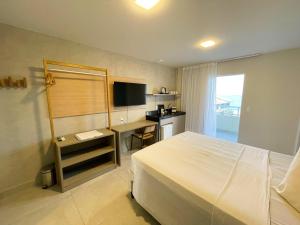 Postel nebo postele na pokoji v ubytování Liiv Mar - Natal Ponta Negra