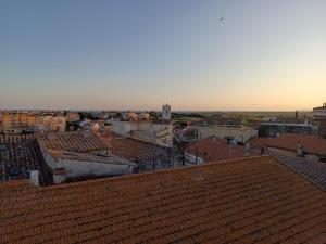 a view of a city with red roofs at Camera Torre Panoramic in Montalto di Castro