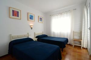 Posteľ alebo postele v izbe v ubytovaní Mar Blau II - Apartamento