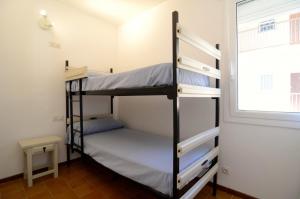 Posteľ alebo postele v izbe v ubytovaní Mar Blau II - Apartamento