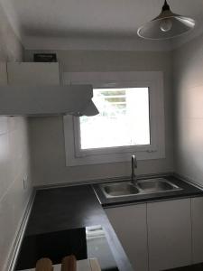 Kuchyňa alebo kuchynka v ubytovaní Mar Blau II - Apartamento