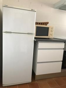Kuchyňa alebo kuchynka v ubytovaní Mar Blau II - Apartamento