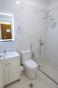 Koupelna v ubytování Hotel Vathi