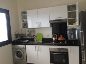 Køkken eller tekøkken på Apartment Cabo Negro Royal Golf and Resort + 10 billeder