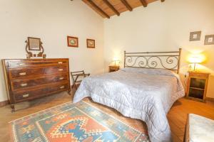 Een bed of bedden in een kamer bij Borgo La Grancia