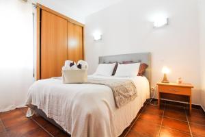 Postel nebo postele na pokoji v ubytování Casa Garcia - Marina Park + 10 fotografií