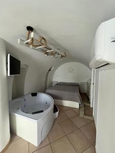 Postel nebo postele na pokoji v ubytování 21mq Suite Homes Ostuni + 37 fotografií