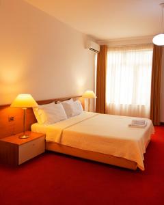 Postel nebo postele na pokoji v ubytování Chateau Linza Resort
