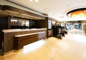 The lobby or reception area at APA Hotel Osaka-Temma