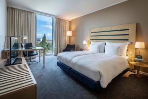 Postel nebo postele na pokoji v ubytování Clarion Hotel Copenhagen Airport