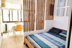 Postel nebo postele na pokoji v ubytování Casita Canaria Blanca Amazing Loft by the Beach