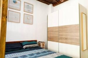 Postel nebo postele na pokoji v ubytování Casita Canaria Blanca Amazing Loft by the Beach